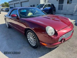 2004 Ford Thunderbird Deluxe z VIN 1FAHP60A54Y110954, wystawiony jako Copart lot #56162245 z przebiegiem 26 244 mil mil oraz Szkody całkowita. Historia ofert i sprzedaży dostępna na DreamBid. Obrazek 4.