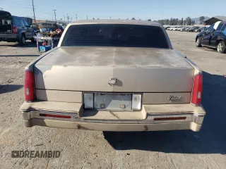 1988 Cadillac Eldorado with VIN 1G6EL1153JU612185, listed as a Copart auction lot 83786144 with 133,882 mi miles and Salvage Title. Bid and sale history available at DreamBid. Image 6.