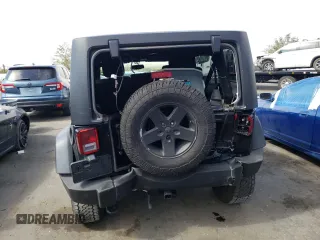 2018 Jeep Wrangler JK Unlimited Sport S with VIN 1C4BJWDG9JL812395, listed as a Copart auction lot 76397134 with 64,866 mi miles and Salvage Title. Bid and sale history available at carsss.com. Image 6.