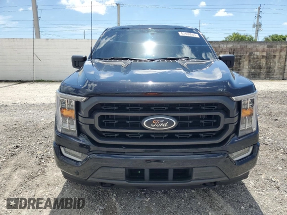 2022 Ford F-150 XL with VIN 1FTFW1E82NFC33590, listed as a Copart auction lot 61806045 with 53,477 mi miles and Salvage title. Bid and sale history available at DreamBid. Image 5.