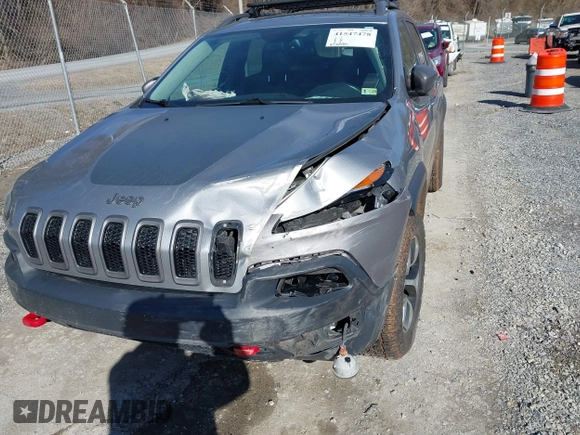 2016 Jeep Cherokee Trailhawk z VIN 1C4PJMBB6GW335837, wystawiony jako IAAI lot #41547478 z przebiegiem 236 483 mil mil oraz . Historia ofert i sprzedaży dostępna na DreamBid. Obrazek 6.