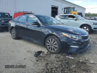2019 Kia Optima LX z VIN 5XXGT4L39KG308627, wystawiony jako Copart lot #55632815 z przebiegiem 154 994 mil mil oraz Szkoda całkowita • Salvage title. Historia ofert i sprzedaży dostępna na DreamBid. Obrazek 4.