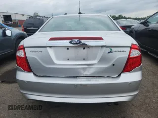 2012 Ford Fusion Hybrid z VIN 3FADP0L34CR227740, wystawiony jako Copart lot #64989475 z przebiegiem 134 862 mil mil oraz Szkoda całkowita • Salvage title. Historia ofert i sprzedaży dostępna na DreamBid. Obrazek 6.
