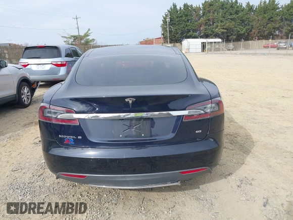 2014 Tesla Model S 60 with VIN 5YJSA1S12EFP42605, listed as a IAAI auction lot 40905031 with 68,155 mi miles and . Bid and sale history available at DreamBid. Image 16.