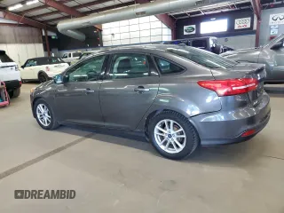 2015 Ford Focus SE with VIN 1FADP3F2XFL249619, listed as a Copart auction lot 63705825 with 118,573 mi miles and Clean title. Bid and sale history available at DreamBid. Image 2.