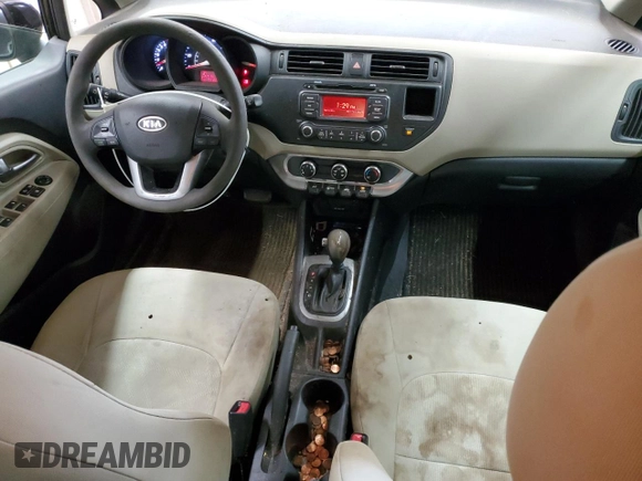 2012 Kia Rio LX with VIN KNADM4A34C6072811, listed as a Copart auction lot 68295334 with 77,167 mi miles and Salvage Title. Bid and sale history available at DreamBid. Image 8.