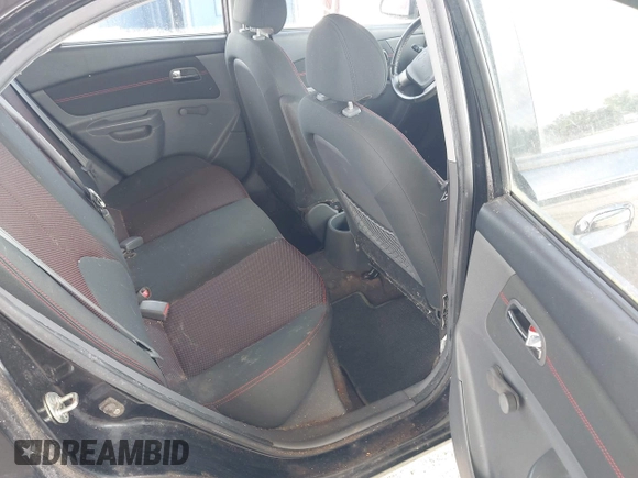 2009 Kia Rio LX with VIN KNADE223496561265, listed as a IAAI auction lot 42143889 with 235,634 mi miles and . Bid and sale history available at DreamBid. Image 8.