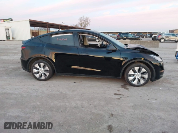 2023 Tesla Model Y Long Range z VIN 7SAYGDEE2PA166042, wystawiony jako IAAI lot #41348960 z przebiegiem Nie podano mil oraz . Historia ofert i sprzedaży dostępna na DreamBid. Obrazek 13.