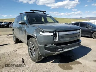 2023 Rivian R1S Adventure z VIN 7PDSGABA3PN018823, wystawiony jako Copart lot #53184595 z przebiegiem 36 677 mil mil oraz Szkoda całkowita • Salvage title. Historia ofert i sprzedaży dostępna na DreamBid. Obrazek 11.
