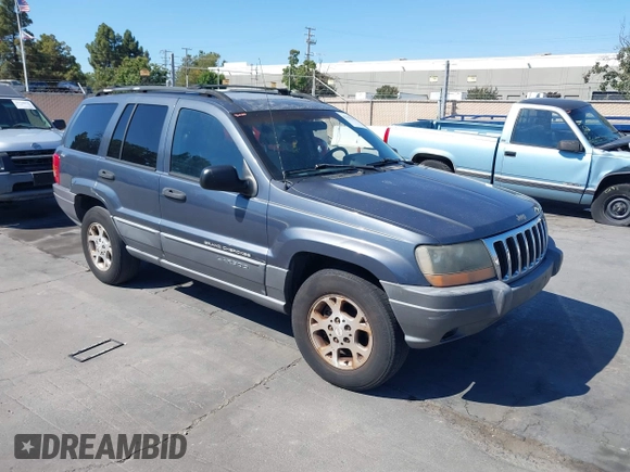 2001 Jeep Grand Cherokee Laredo with VIN 1J4GW48S31C550460, listed as a IAAI auction lot 42769410 with 261,640 mi miles and . Bid and sale history available at DreamBid. Image 1.