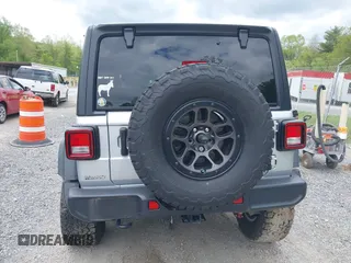 2023 Jeep Wrangler Sport S с VIN 1C4HJXDN0PW511682, выставлен на аукционе IAAI как лот 42199890 с пробегом 29 061 миль миль и . История ставок и продаж доступна на DreamBid. Изображение 16.