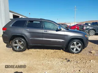 2014 Jeep Grand Cherokee Limited with VIN 1C4RJEBT5EC228056, listed as a IAAI auction lot 41454896 with Not Provided miles and . Bid and sale history available at DreamBid. Image 14.