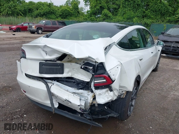2019 Tesla Model 3 Mid Range z VIN 5YJ3E1EA7KF299755, wystawiony jako IAAI lot #42354352 z przebiegiem Nie podano mil oraz . Historia ofert i sprzedaży dostępna na DreamBid. Obrazek 6.