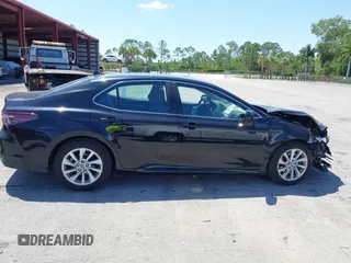 2023 Toyota Camry LE z VIN 4T1C11AK2PU120803, wystawiony jako IAAI lot #42060384 z przebiegiem 38 897 mil mil oraz . Historia ofert i sprzedaży dostępna na DreamBid. Obrazek 14.