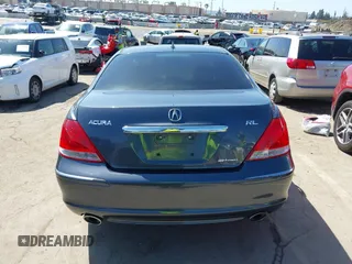 2006 Acura RL z VIN JH4KB16516C004396, wystawiony jako IAAI lot #41959850 z przebiegiem 114 670 mil mil oraz . Historia ofert i sprzedaży dostępna na DreamBid. Obrazek 15.