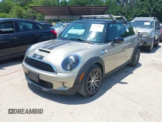 2009 MINI Hardtop S with VIN WMWMF73529TX40576, listed as a IAAI auction lot 42462085 with 77,936 mi miles and . Bid and sale history available at DreamBid. Image 2.