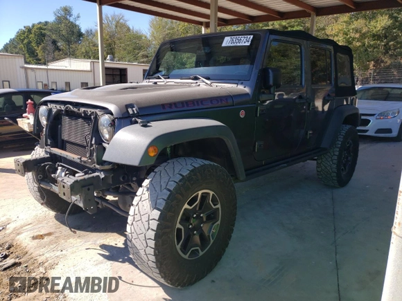 2016 Jeep Wrangler Unlimited Rubicon Hard Rock with VIN 1C4HJWFG7GL239318, listed as a Copart auction lot 76356734 with 121,442 mi miles and Salvage Title. Bid and sale history available at carsss.com. Image 1.
