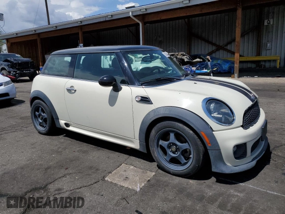 2013 MINI Hardtop with VIN WMWSU3C58DT373021, listed as a Copart auction lot 52945845 with 83,865 mi miles and Salvage Title. Bid and sale history available at DreamBid. Image 4.
