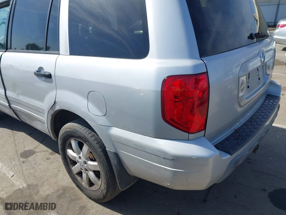 2003 Honda Pilot EX with VIN 2HKYF18443H571688, listed as a IAAI auction lot 42097297 with 313,910 mi miles. Bid and sale history available at carsss.com. Image 14.