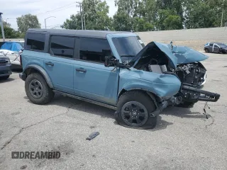 2022 Ford Bronco with VIN 1FMEE5DP4NLB75249, listed as a Copart auction lot 51797915 with 55,347 mi miles and Salvage Title. Bid and sale history available at DreamBid. Image 4.
