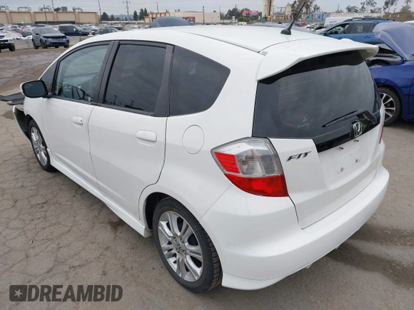 2009 Honda Fit Sport with VIN JHMGE88409S021730, listed as a IAAI auction lot 42045023 with 309,995 mi miles. Bid and sale history available at carsss.com. Image 3.