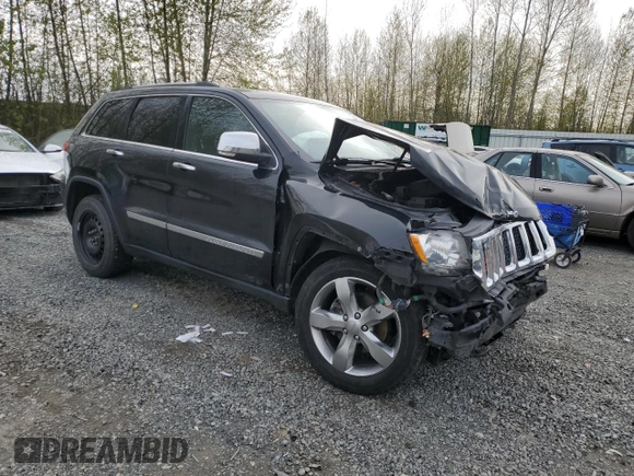 2013 Jeep Grand Cherokee Overland with VIN 1C4RJFCGXDC643802, listed as a Copart auction lot 52429535 with 122,014 mi miles and Salvage Title. Bid and sale history available at carsss.com. Image 4.