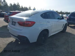 2015 BMW X6 xDrive35i with VIN 5UXKU2C50F0N77117, listed as a IAAI auction lot 41901159 with 104,820 mi miles. Bid and sale history available at carsss.com. Image 4.