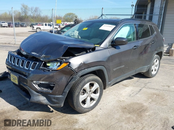 2018 Jeep Compass Altitude with VIN 3C4NJDBB6JT239565, listed as a IAAI auction lot 42219401 with 85,013 mi miles and . Bid and sale history available at DreamBid. Image 2.