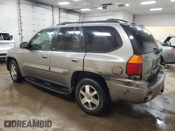 2005 GMC Envoy SLE with VIN 1GKDS13S952383743, listed as a Copart auction lot 43797315 with 185,833 mi miles and Salvage title. Bid and sale history available at DreamBid. Image 2.