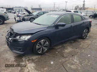 2018 Honda Civic EX-T z VIN JHMFC1F32JX006088, wystawiony jako Copart lot #50563105 z przebiegiem 117 744 mil mil oraz Szkoda całkowita • Salvage title. Historia ofert i sprzedaży dostępna na DreamBid. Obrazek 1.