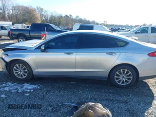 2015 Ford Fusion S with VIN 3FA6P0G77FR135015, listed as a IAAI auction lot 41399694 with 132,175 mi miles. Bid and sale history available at carsss.com. Image 14.
