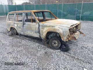 1996 Jeep Cherokee Country with VIN 1J4FJ78S2TL102161, listed as a IAAI auction lot 41932323 with Not provided miles and . Bid and sale history available at DreamBid. Image 1.