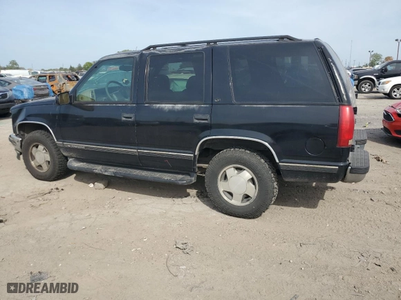 1999 Chevrolet Tahoe Z71 with VIN 1GNEK13R6XJ411348, listed as a Copart auction lot 71179204 with 162,752 mi miles and Salvage Title. Bid and sale history available at carsss.com. Image 2.