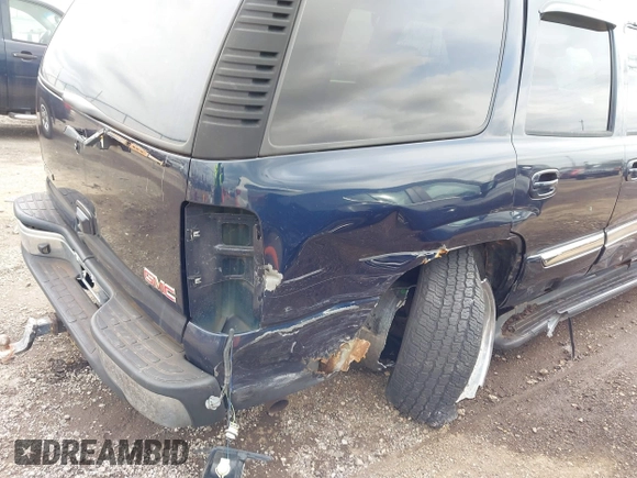 2004 GMC Yukon SLT with VIN 1GKEK13Z74R114583, listed as a IAAI auction lot 41834400 with 311,567 mi miles. Bid and sale history available at carsss.com. Image 6.
