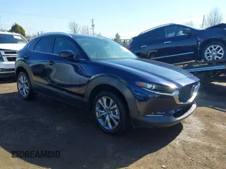 2023 Mazda CX-30 2.5 S Select Package with VIN 3MVDMBBM8PM577933, listed as a IAAI auction lot 41810373 with 21,556 mi miles. Bid and sale history available at carsss.com. Image 1.