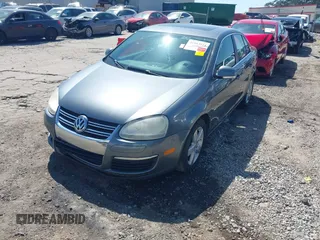 2009 Volkswagen Jetta Sedan SE with VIN 3VWRM71K09M175327, listed as a IAAI auction lot 41983924 with 217,285 mi miles. Bid and sale history available at carsss.com. Image 2.