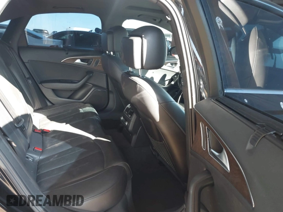 2016 Audi A6 Premium Plus z VIN WAUGFAFC8GN103391, wystawiony jako IAAI lot #41341007 z przebiegiem 130 581 mil mil oraz . Historia ofert i sprzedaży dostępna na DreamBid. Obrazek 8.