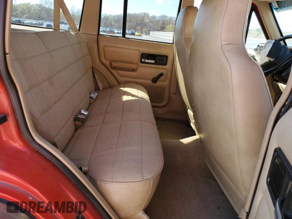 1995 Jeep Cherokee Sport with VIN 1J4FJ68S2SL666126, listed as a Copart auction lot 50496735 with 158,523 mi miles and Salvage title. Bid and sale history available at DreamBid. Image 10.