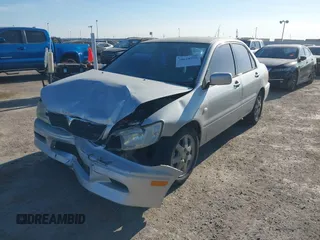 2002 Mitsubishi Lancer LS with VIN JA3AJ36E22U035784, listed as a IAAI auction lot 40628995 with 1 mi miles. Bid and sale history available at carsss.com. Image 2.