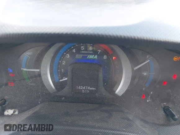 2010 Honda Insight EX with VIN JHMZE2H71AS017996, listed as a IAAI auction lot 42091356 with 142,474 mi miles and . Bid and sale history available at DreamBid. Image 7.