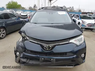 2018 Toyota RAV4 XLE with VIN JTMRFREV6JJ248098, listed as a IAAI auction lot 42042239 with 74,765 mi miles. Bid and sale history available at carsss.com. Image 12.