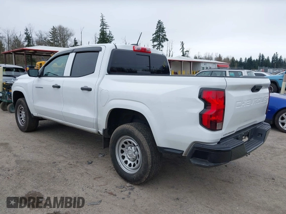 2023 Chevrolet Colorado 2WD Work Truck z VIN 1GCGSBECXP1210035, wystawiony jako IAAI lot #41906185 z przebiegiem 15 001 mil mil oraz . Historia ofert i sprzedaży dostępna na DreamBid. Obrazek 3.