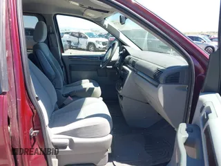 2006 Ford Freestar SEL z VIN 2FMZA52206BA39187, wystawiony jako IAAI lot #42152720 z przebiegiem 128 617 mil mil oraz . Historia ofert i sprzedaży dostępna na DreamBid. Obrazek 5.