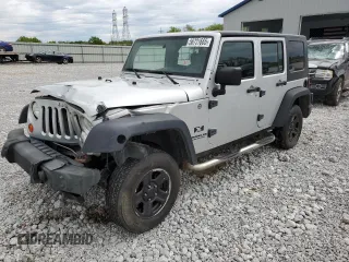 2007 Jeep Wrangler Unlimited X with VIN 1J4GA39117L169245, listed as a Copart auction lot 56731665 with 136,247 mi miles and Salvage title. Bid and sale history available at DreamBid. Image 1.