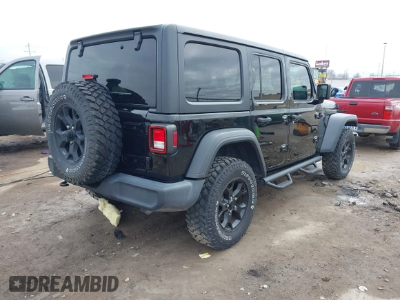 2021 Jeep Wrangler Unlimited Willys with VIN 1C4HJXDN8MW595665, listed as a IAAI auction lot 41507555 with 24,505 mi miles and . Bid and sale history available at DreamBid. Image 4.