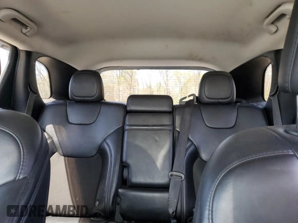 2019 Jeep Cherokee Latitude Plus with VIN 1C4PJMLB2KD199130, listed as a Copart auction lot 54549035 with 99,128 mi miles and Salvage Title. Bid and sale history available at carsss.com. Image 10.