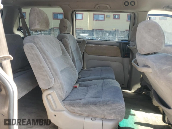 2004 Honda Odyssey EX-RES z VIN 5FNRL18814B125773, wystawiony jako Copart lot #58205565 z przebiegiem 250 732 mil mil oraz Szkoda całkowita • Salvage title. Historia ofert i sprzedaży dostępna na DreamBid. Obrazek 11.