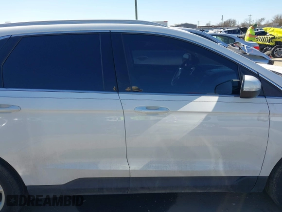 2019 Ford Edge SEL z VIN 2FMPK3J97KBC73053, wystawiony jako IAAI lot #41434650 z przebiegiem 136 425 mil mil oraz . Historia ofert i sprzedaży dostępna na DreamBid. Obrazek 14.