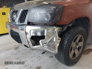2007 Nissan Titan XE with VIN 1N6BA07A57N233449, listed as a IAAI auction lot 41381833 with 176,720 mi miles. Bid and sale history available at carsss.com. Image 6.
