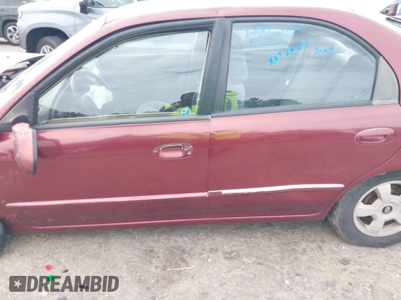 2002 Kia Spectra GS z VIN KNAFB161925092898, wystawiony jako IAAI lot #41753073 z przebiegiem 120 054 mil mil oraz . Historia ofert i sprzedaży dostępna na DreamBid. Obrazek 14.